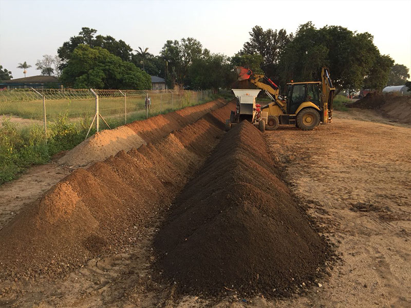 Treated wind rows ready for backfill